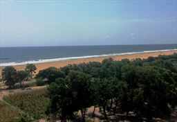 beach fishermen in distance