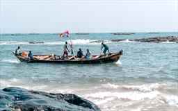 fishermen in a coanoe