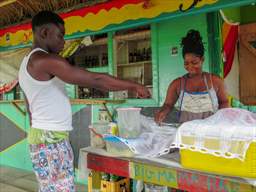 man ordering food at ghana chop bar