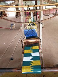 triple weave kente cloth on loom