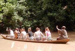 visitors in canoe at mognori