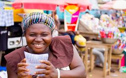 Woman selling water sachet in Ghana